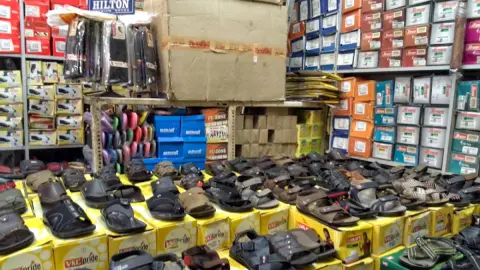 Delux Foot Wear — Shoe store on SP Road, Bangalore